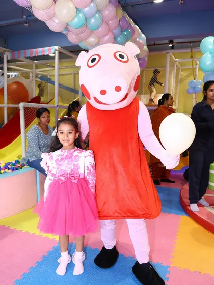 A special moment for the birthday girl with Peppa Pig. We love creating these magical memories.