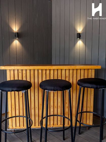 This is a 3-unit container project I built in South Coorg for a homestay near the Nagarhole Forest. The design includes a cozy bar area on the deck, perfect for guests to relax and enjoy the jungle experience.