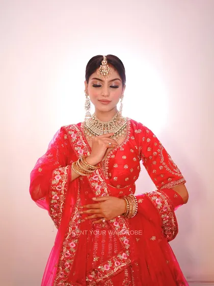 A detailed shot of the blouse and jewellery. Notice how the accessories complement the outfit, a service I provide for every look you shoot.
