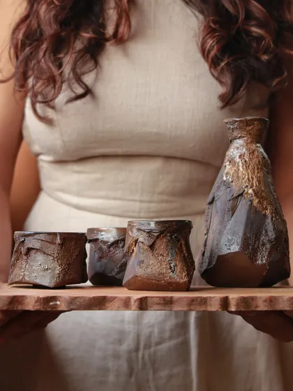 This is a set of functional art from my Kurinuki collection, a Japanese technique of carving from a solid block of clay. The pieces are designed for daily rituals, connecting you to the raw, sculptural nature of the material.