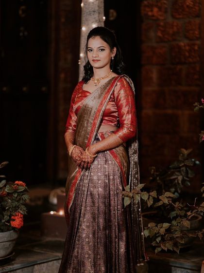 For the evening part of her engagement, the bride changed into a half-saree. I adjusted her makeup to be slightly more glamorous for the nighttime celebration.