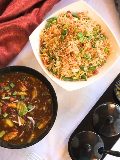 Get your taste buds dancing with our Burnt Garlic Fried Rice and Exotic Vegetables in Hunan Sauce. A spicy, savory, and satisfying meal.