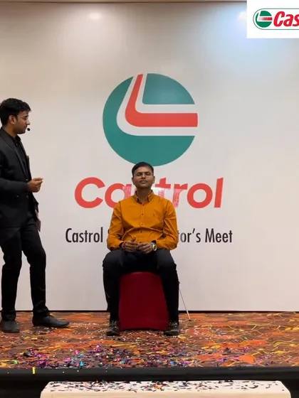A volunteer is seated for a mind-reading demonstration during the Castrol show.