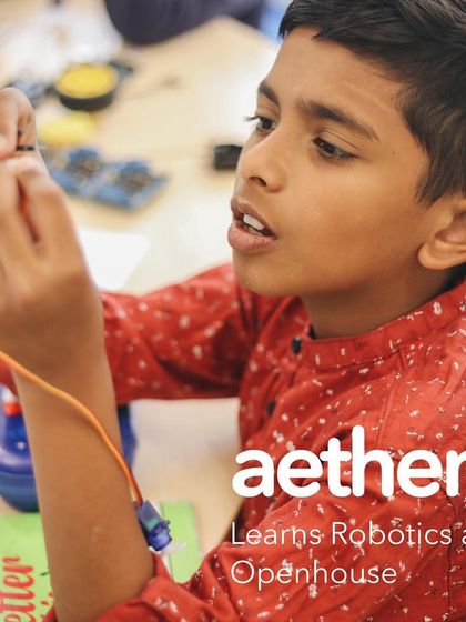 A close-up of Aethen connecting wires, showcasing the fine motor skills and concentration developed during our robotics sessions.