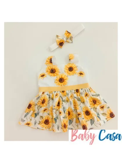 A sunny sunflower-print dress with a matching headband. This cheerful outfit is perfect for brightening up any day.