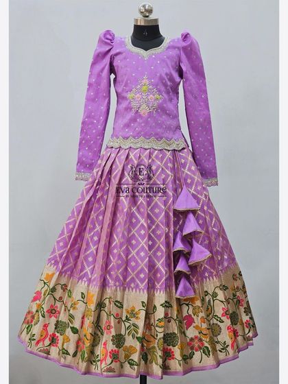 A full-sleeved lehenga in purple, with a beautiful Paithani-style border. Ideal for creating elegant mom-daughter sets.