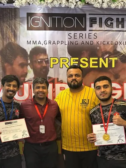 The team with me after the Ignition Fight Series. We dominated on the mats and in the ring, a testament to our well-rounded training in both grappling and striking.