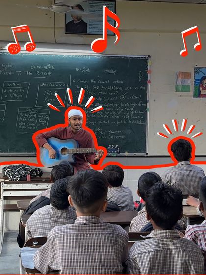 A fellow plays a bright blue guitar, immediately capturing the students' attention. Using colorful and inviting instruments is one way we make our music classes for kids exciting.