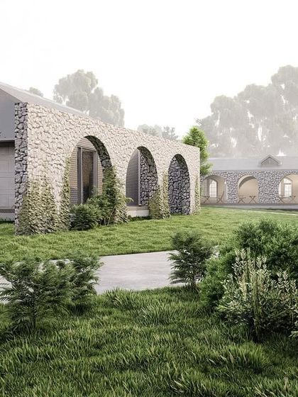 The design render for a 10,000 sq.ft. luxury farmhouse. After months of planning, we are excited to bring this vision of stone arches and natural integration to life.