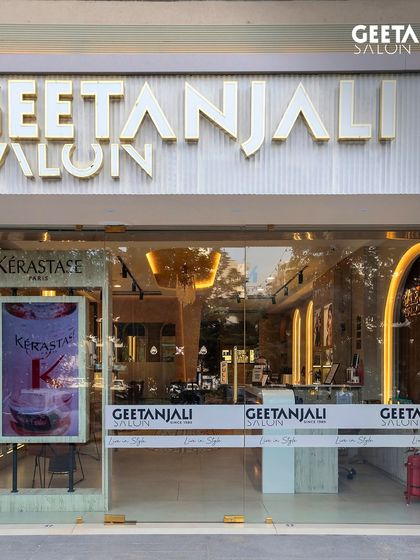 The sleek and modern entrance to our new salon at Maple Tree, Ahmedabad, where your ultimate beauty experience begins.