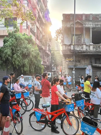 The golden morning light illuminates the historic buildings of Old Delhi as our group listens to another fascinating story. These are the moments that make our tours so special.