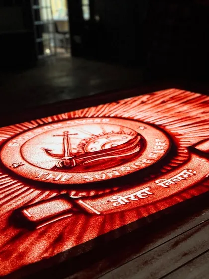 This piece, glowing with purpose, is the new crest of the Indian Navy's Eastern Fleet, which I had the honor of unveiling through my art. Working with prestigious national institutions to mark moments of transformation is a profound responsibility. This sand art logo reveal highlights my work for significant and formal occasions.