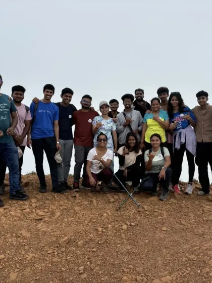 A happy group of trekkers at a summit on a clear, sunny day. We run treks in all seasons, each offering a different experience.