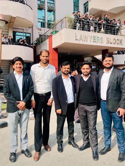 With fellow advocates outside the Lawyers Block. The legal community is built on support and collaboration, which is crucial during events like court elections.