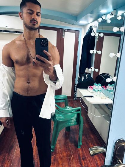 A quick selfie from the vanity room before a shoot. The life of a model often involves a lot of waiting, but staying ready is part of the job.