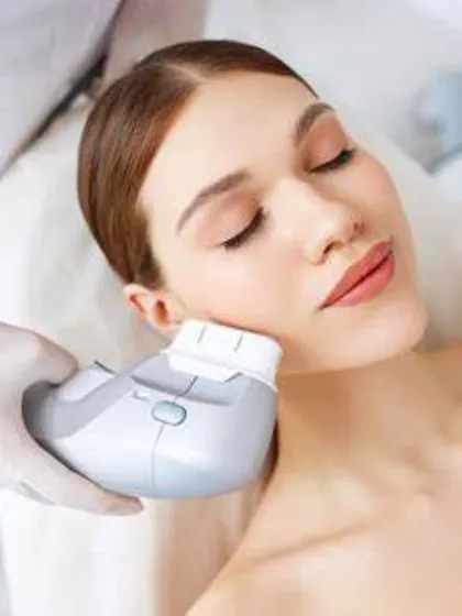 This image shows a High-Intensity Focused Ultrasound (HIFU) treatment in progress. It is a powerful, non-surgical method I use to lift and tighten sagging skin by stimulating your body's own collagen production from deep within.