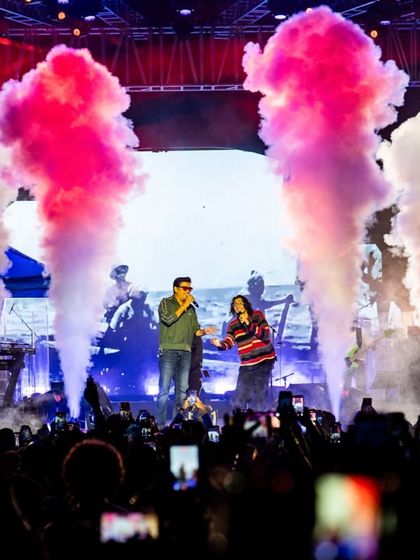 A key part of our service is creating iconic moments. We coordinated this surprise on-stage collaboration during Sanjith Hegde's concert, complete with synchronized smoke effects for maximum impact.