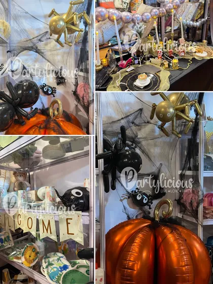A spooky and stylish Halloween setup. This collage shows our decor for an exhibition, featuring spider and pumpkin balloons, cobwebs, and a chic black and gold tablescape.