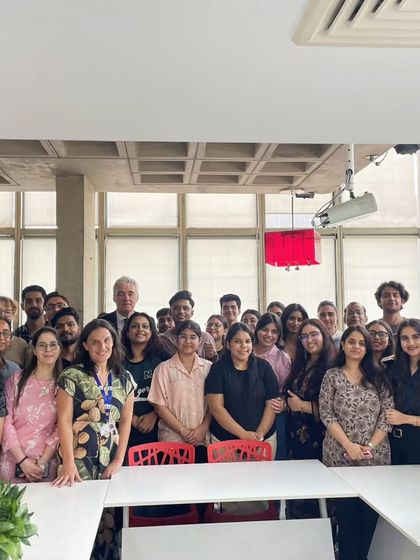 A large group photo of our students and team with Dominique Antoine. His visit was an enriching experience for our entire community, reinforcing the value of our cultural mission.