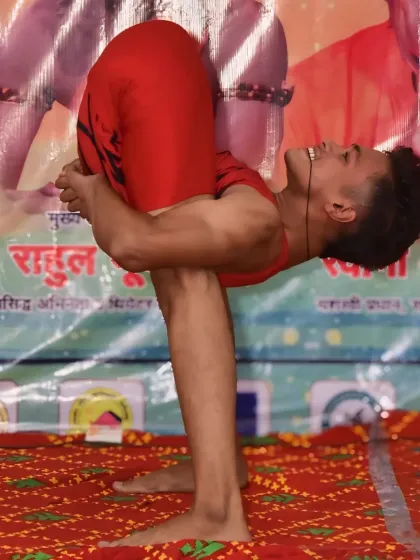 The joy on my face says it all. This is a moment from a performance, showing a deep backbend that is part of the journey, not just a pose.