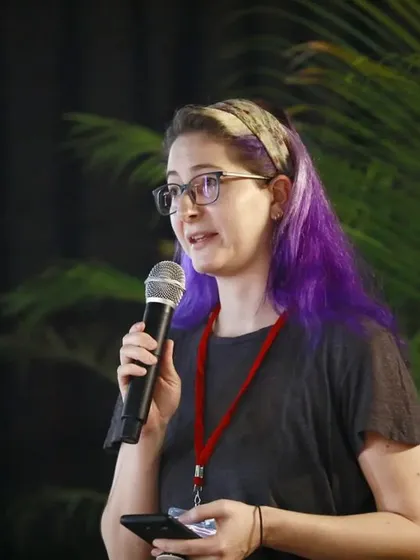 An international participant from Austria speaking at our conference. Our festivals bring together a global community of puppeteers and academics to exchange ideas and innovations.