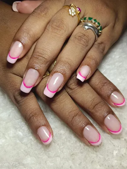French nails are always in fashion. This is a modern take with a bold pink outline instead of a traditional tip.