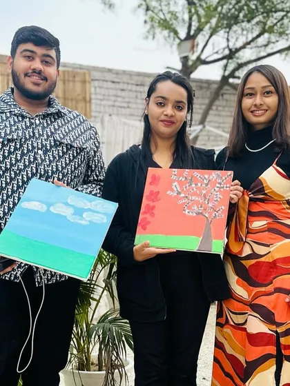 Three more participants showing off their beautiful creations. We had a lovely cherry blossom tree and a peaceful sky landscape painted during this session. It’s always a joy to see what everyone makes.