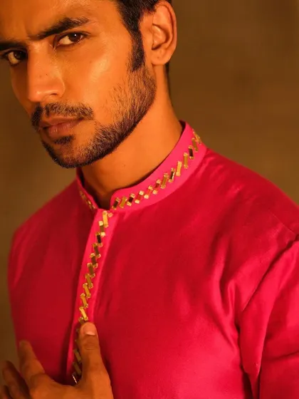 A detailed close-up on a groom's face, highlighting the clean and defined grooming. This showcases my attention to detail in creating a flawless, masculine look that is completely natural.