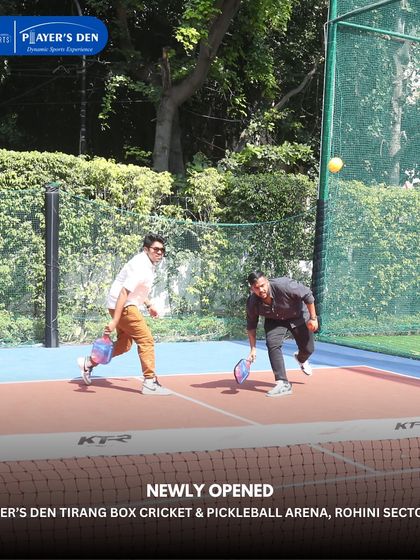 An action shot of a doubles pickleball match at our newly opened Rohini location. The game is fast, fun, and a great way to get moving.