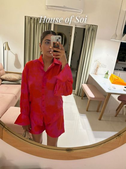 This vibrant pink and red co-ord set is such a mood-booster. The color is amazing and the bell sleeves add a fun, dramatic touch.