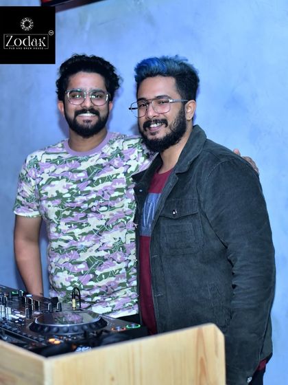 Sharing a moment with a friend during my set at Zodak.