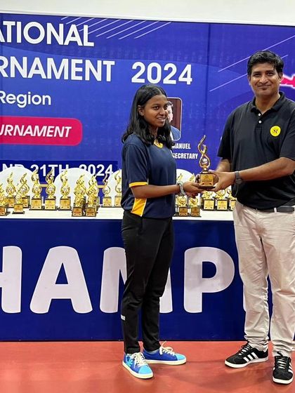 A student receives her trophy at the CISCE National Shooting Tournament 2024, hosted by our club. We believe in celebrating every achievement on the path to greatness.