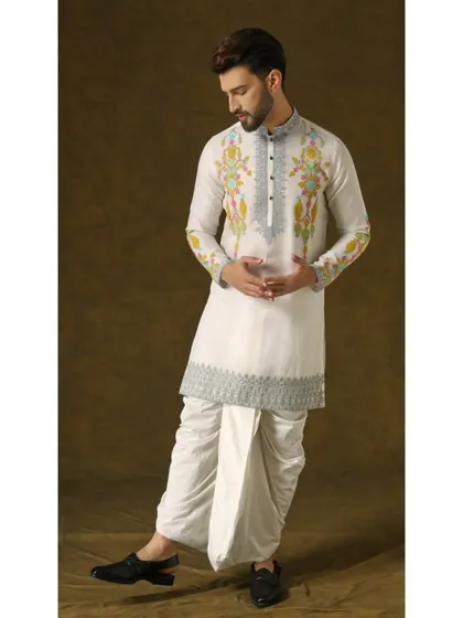 A full look of the Narayan Nirvana set, showing the balance between the detailed kurta and the simple elegance of the ivory dhoti.