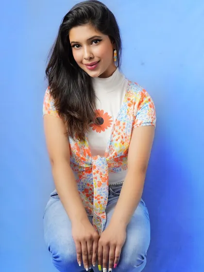 Layering a cute floral shrug over a simple top and jeans is an easy way to add interest to a casual outfit. This is a great tip for transitioning from a warm day to a cooler evening.