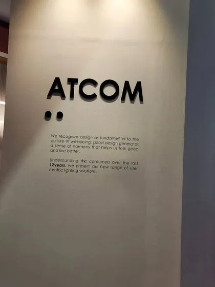 Our company name, ATCOM, displayed on the wall of our booth. We are grateful for everyone who visited us and look forward to the collaborations that began at events like this.