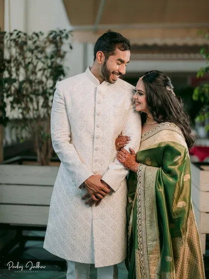 A shared laugh between Ojasi and Rutvik at their Pune engagement. Capturing these unscripted moments of joy is what I love most.
