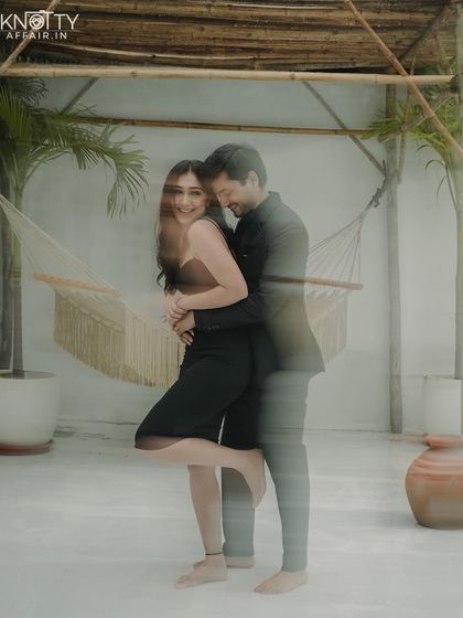 A dreamy, layered effect created by shooting through a textured surface. This artistic technique adds a soft and romantic feel to their portrait.