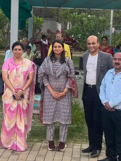 A group photo with officials from the Nashik Municipal Corporation and the event mascot during the voting awareness painting competition for children.