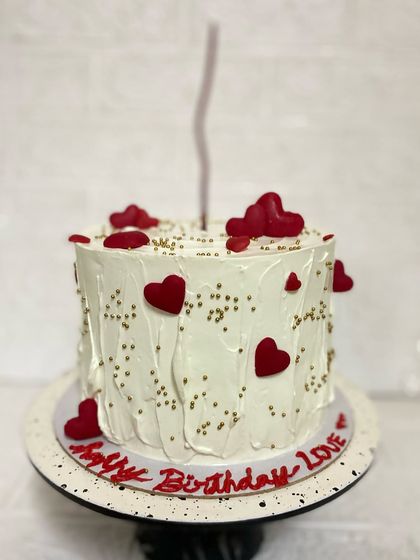 The heart-themed cake from our custom birthday hamper, ready to be boxed up.