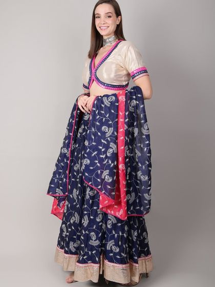 This image highlights the back of the royal blue lehenga set, showing how the lightweight dupatta can be draped gracefully for easy movement.