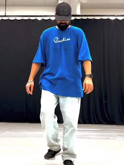 A candid shot of me walking across the studio floor. Even a simple walk can be a dance move when you have the right intention.