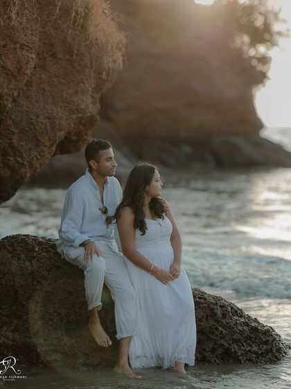 Looking out at the ocean together. This candid shot from a Goa couple session captures a simple, shared experience, highlighting their connection in a natural and unobtrusive way.