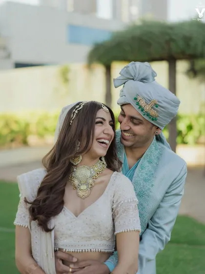 The unscripted laughter between a couple is one of our favorite things to capture. This candid moment showcases our documentary style, focusing on the real, unfiltered joy that makes each wedding unique.
