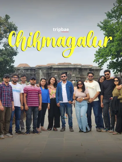 A group shot in front of a historic temple in the Chikmagalur region, showcasing the rich heritage of the area.
