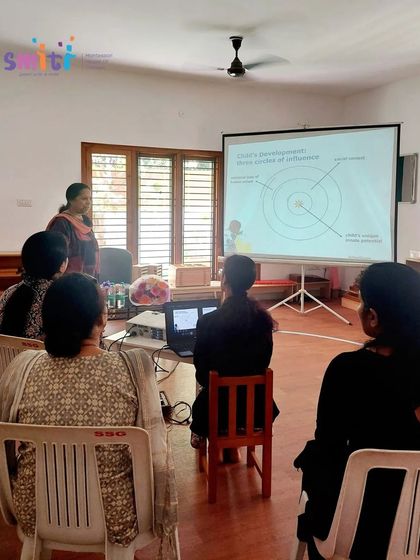 Our founder, Amukta Mahapatra, leading a workshop at Smiti Montessori House of Children on the developmental phases of children and their evolving needs.