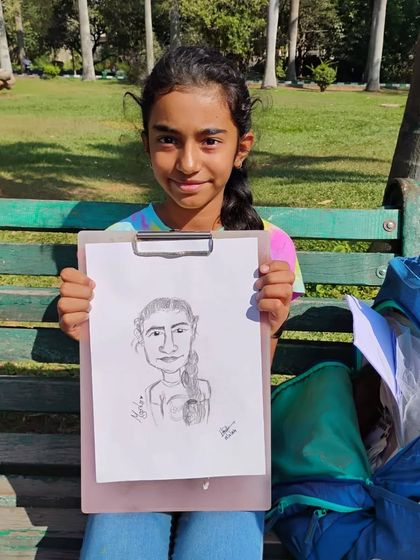 Meet the awesome girl Megha. Her expression is so cute. It's a joy to create these fun portraits.