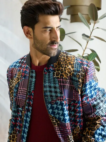 Elevate your style with this eye-catching plaid and leopard print jacket. Crafted from a premium polyester blend, its bold mix of patterns redefines classic vibes for a fashion-forward wardrobe.
