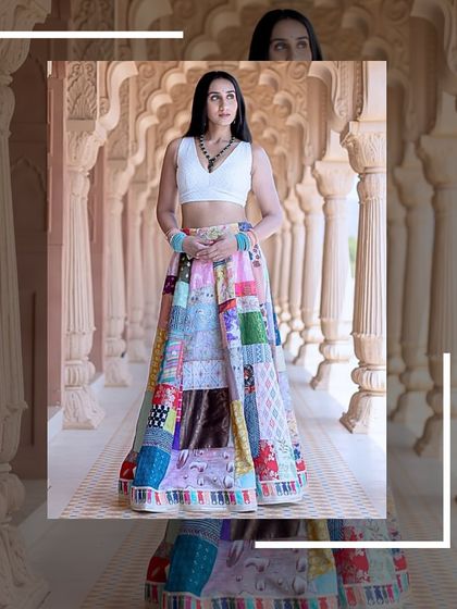 A full-length shot of the colorful patchwork lehenga, showing its beautiful flow and unique design.