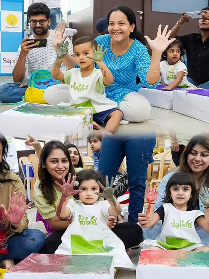 Getting your hands messy is part of the fun! At our Family Playart Parties, we encourage kids to dive into the world of color. This photo captures the sensory joy of finger painting, an activity that helps develop fine motor skills in a playful, creative environment.