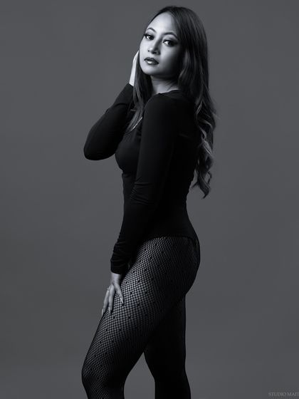 A simple and elegant side-profile portrait in black and white.